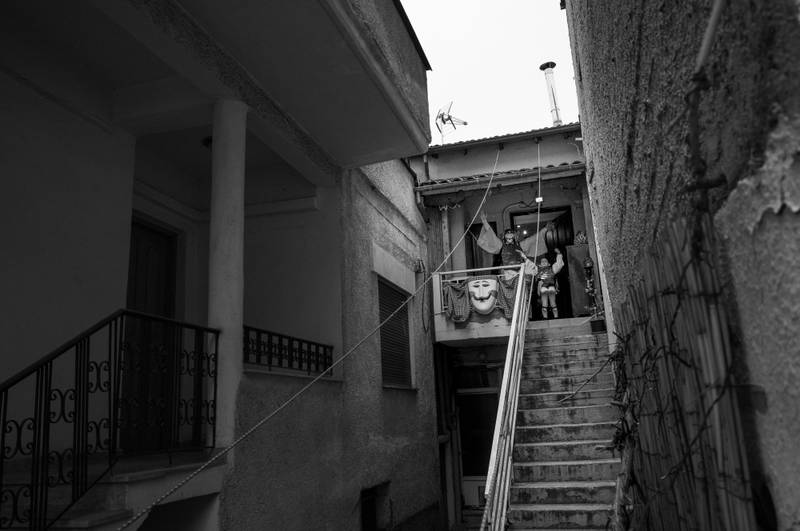 Father and son are greeting the mpoulouki