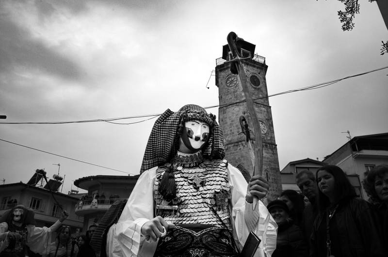 Genitsaros holding his sword upside-down in the clock tower.
