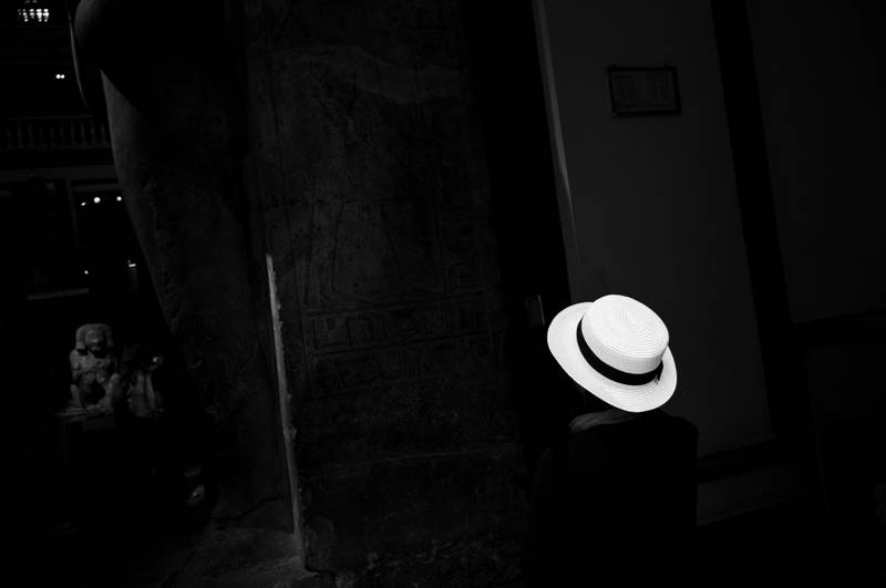 Girl with hat in the museum